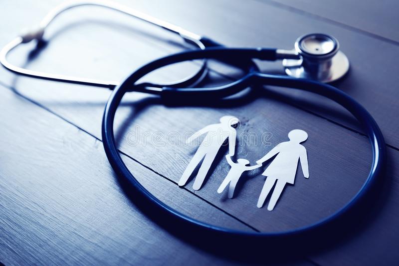 family health care insurance concept family health care insurance concept stethoscope paper cut family 102883760